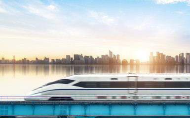 High-speed rail speeds on Bridges and the modern city skyline of chongqing, China