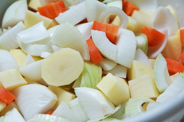 Vegetables for the stewed dish which was served in a plate, and was cut