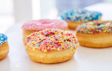 Doughnuts assorted on white. Close up view