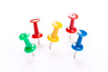 Push pins isolated on white background.