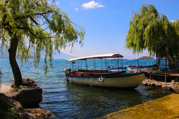 Naklejka na ściany i meble Boats for the transport of tourists on Lake Ohrid, Republic of North Macedonia