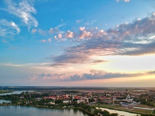 panorama of city at sunset with clouds and sky