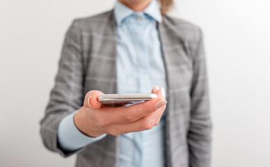 Business concept with mobile phone and business woman.
