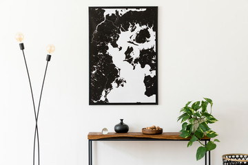 Design scandinavian interior of living room with wooden console, ring on the wall, black vase, modern lamp and elegant personal accessories. Stylish mock up poster map. Nice home decor. Template. 