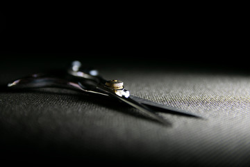 professional scissors on black background