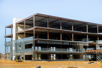 Building under construction with steel beam