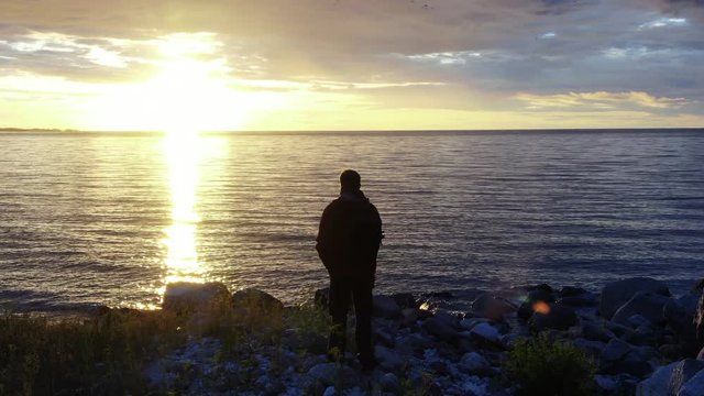 man at sunset Shot on drone