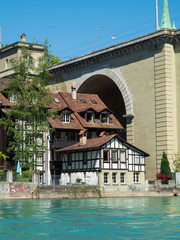 Bern, Switzerland - Jun 1st 2019: .The Aare river flows around three sides of the city of Bern. With its crystal-clear turquoise water
