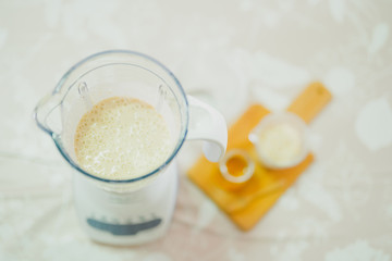 healthy lifestyle and diet concept from flat lay view by mix and spin oatmeal honey and other ingredients in bowl for make diet breakfast with copy space and soft focus background