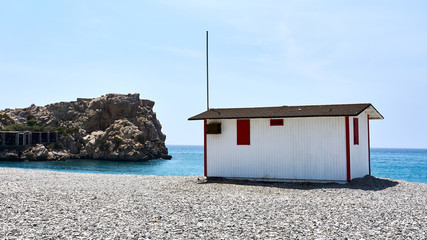 Obraz na płótnie Canvas small house in front of the sea
