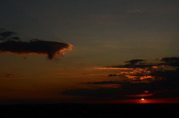 Sunset silhouette of church cross at sunset