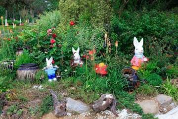 sculptures of rabbit models in the garden
