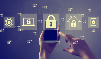 Cyber security theme with person holding a white smartphone