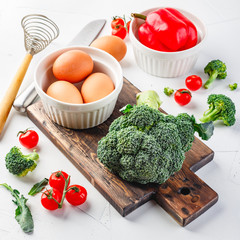 Healthy vegetables broccoli, tomato and bell pepper and eggs