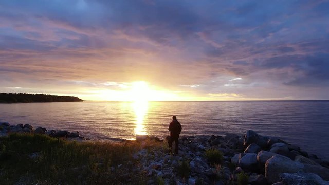 man at sunset. Shot on drone