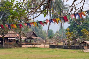 Colourful ribbon at Entrance of Tham Xang (Elephant Cave), Vang Vieng, Laos