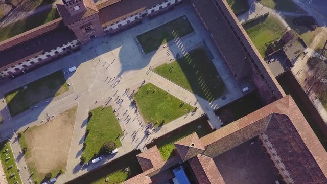 Aerial view of the medieval castle of stone Castello Sforzesco in Milan. Aerial photography with the help of a drone. Horizon. Architecture of urban construction. Historical monuments of Italy