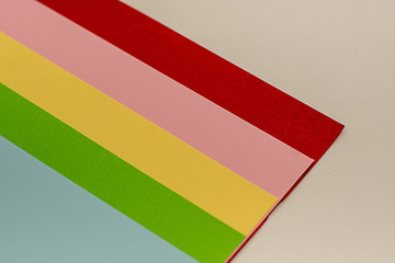 Colorfull paper background - red pink yellow green blue