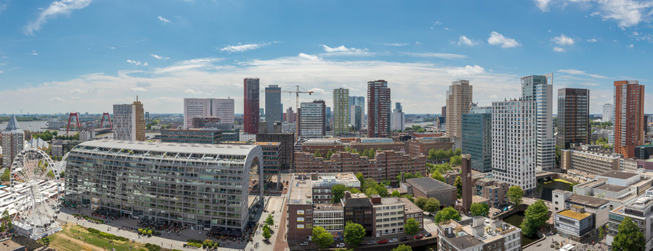 Panoramic cityscape of the city of Rotterdam on a sunny day © dropStock