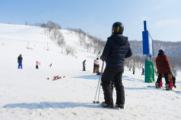 Fototapeta na wymiar People enjoy ski at Niseko Annupuri Kokusai Ski Area at Niseko, Hokkaido,Japan