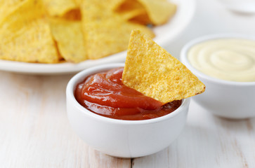 Nachos chips with ketchup