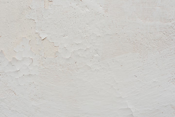 Texture of a concrete wall with cracks and scratches which can be used as a background