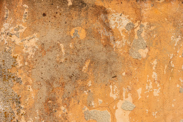 Texture of a concrete wall with cracks and scratches which can be used as a background