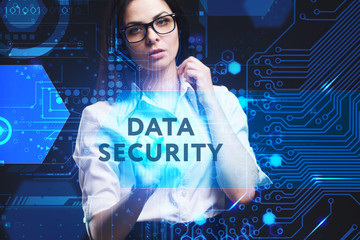 The concept of business, technology, the Internet and the network. A young entrepreneur working on a virtual screen of the future and sees the inscription: Data security
