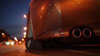 car's air suspension system back view, video in the evening.