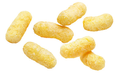 Falling delicious sweet corn sticks, isolated on white background