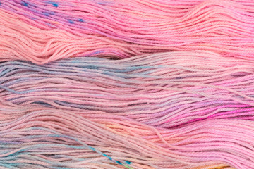 Obraz premium background of multicolored pink wool with yellow, blue and lilac