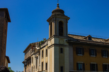 Rome, Italia.07 / 07/2019. The bell tower of a church. The arches that enclose the bells are visible.