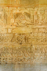 Fototapeta na wymiar Story of Yama God of Death of Hinduism Mythology on the Stone Wall Carving inside of Angkor Wat at Siem Reap Province, Cambodia.