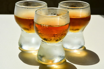 Vodka glasses covered with frost after cooling