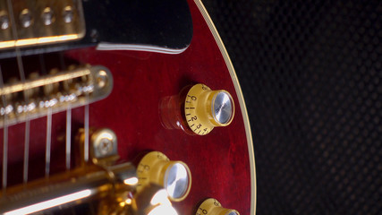 musician playing guitar at studio . closeup