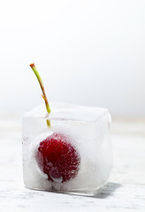 frozen cherry on table