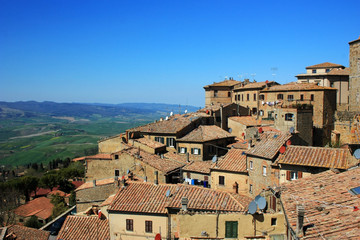 Obraz premium Medieval stone buildings in the city of Volterra, Italy