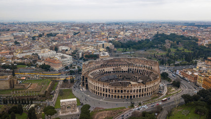 Fototapeta na wymiar Aerial view of the Colosseum in the ancient city of Rome, Italy. Drone photography.