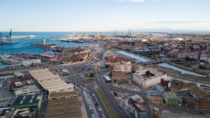 Aerial view of the pier with yachts and boats in the city of Valencia, Spain. Drone photography.