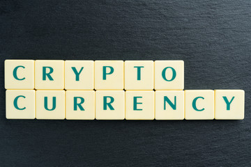 Cryptocurrency text made out of letter tiles.