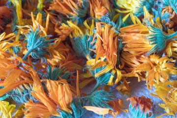 dried calendula flowers on the table
