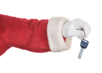 Santa Holding a set of Car keys isolated over white. Hand and arm only