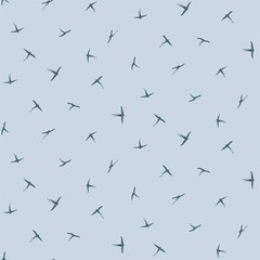 Minimalistic swallows on a blue background. Birds in flight. Silhouette of flying swallows in the sky.