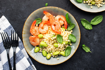 Healthy food is a dish for healthy diet. Shrimp, petite, edamame beans, black sesame, red pepper for lunch. Look all over. Portional feed. Balanced Diet Bowl,