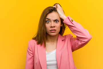 Young fashion business woman being shocked, she has remembered important meeting.