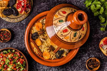 Traditional moroccan tajine of chicken with dried fruits and spices.