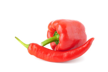 Red paprika and sweet pepper isolated on white background