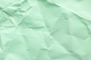 Obraz premium Sheet of color crumpled paper as background. Space for design