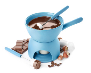 Fondue pot with chocolate and marshmallow isolated on white
