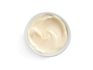 Fototapeta na wymiar Delicious mayonnaise sauce in bowl on white background, top view
